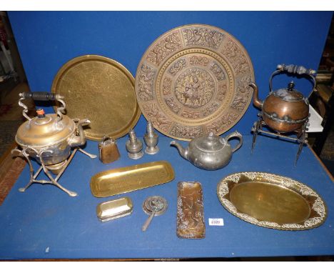 A quantity of brass and pewter to include large charger, brass water kettles, brass trays, bell, teapot, brass handled coal s