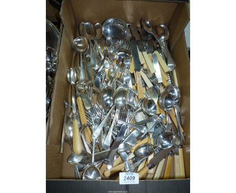 A quantity of miscellaneous cutlery including forks, knives, dessert spoons, soup spoons, ladle, serving spoons etc.