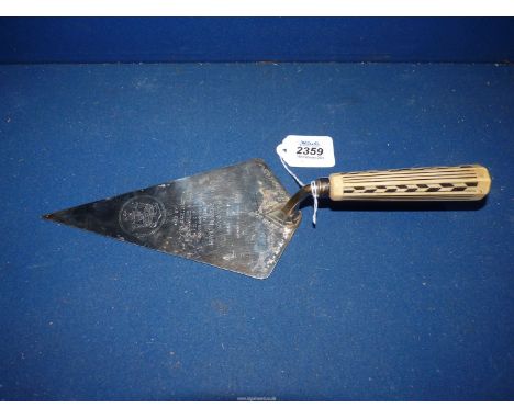 A Sterling silver presentation Trowel with Bakelite handle with the inscription 'Used By His Excellency Sir Charles A. Innes 