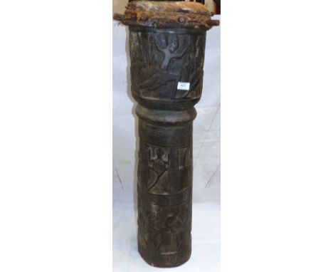 An African carved wood trunk drum and a tribal stick; a Chinese seat and vase