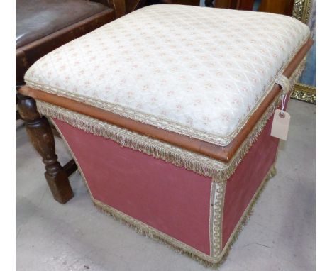 An early 20th century seat/stool, hinged top and cushion seat