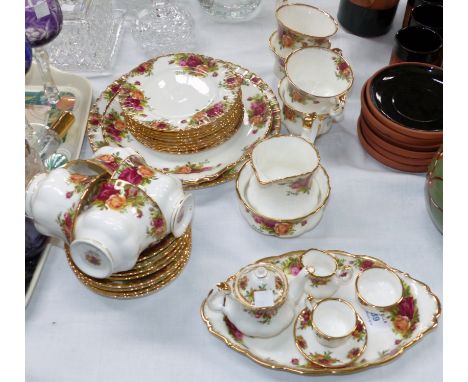 A Royal Albert "Old Country Roses" tea service, 29 pieces; a child's 5 piece part service