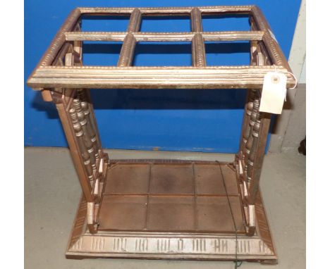 A cast iron stick stand, with registration mark, c. 1885