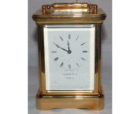 A modern brass carriage clock with twin train movement striking on bell, by Garrard & Co, London, with certificate