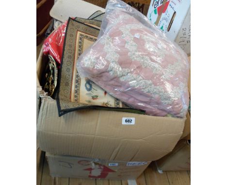 Two boxes containing a quantity of textiles including curtains, etc.
