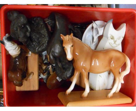 A box containing a quantity of ceramic and other horse and other animal figurines including Carn pottery cat, etc.