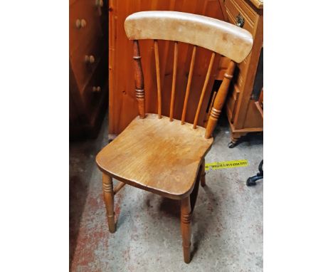 A stick back kitchen chair with moulded solid elm seat, set on ring turned supports