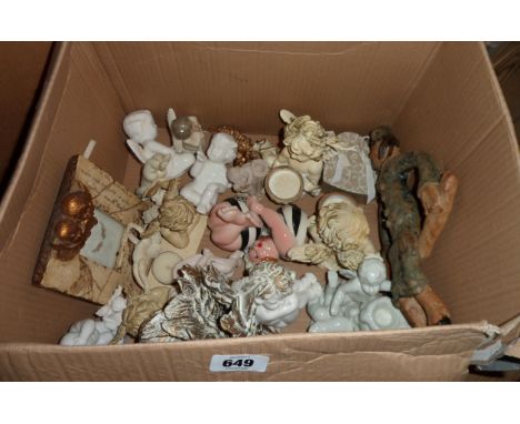 A box containing a quantity of assorted collectable cherub and other figurines including resin, ceramic, etc.