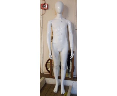 A modern plastic child size mannequin - base a/f