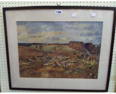 A framed coloured hunting print with man and hounds
