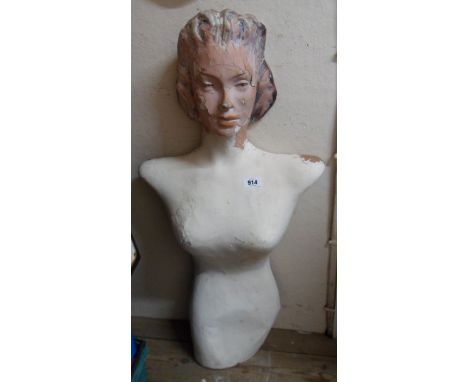 A 1940's composition wall hanging shop mannequin with remains of original finish to head - a/f