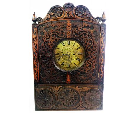 A 61cm high antique ornate carved oak cased bracket clock, the 20cm square brass dial marked for Rob. Watts of Stamford, with