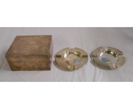 A pair of small silver ashtrays with engine turned decoration - sold with a silver cigarette box with wood lining