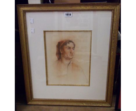 A gilt framed indistinctly signed portrait of a young man in pastels, dated 1913 - 31cm X 24.5cm