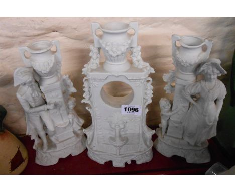 A German Bisque porcelain clock garniture, the central piece depicting a mask headed fountain with urn above, each garniture 