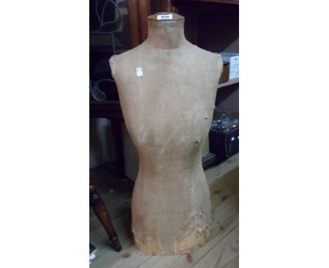 A vintage dressmaker's mannequin - no stand and damage to canvas