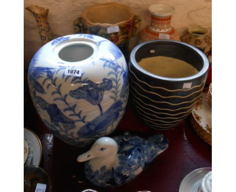 A modern ceramic jardiniere, a modern blue and white porcelain model of a duck, a modern Chinese porcelain jar - sold with th