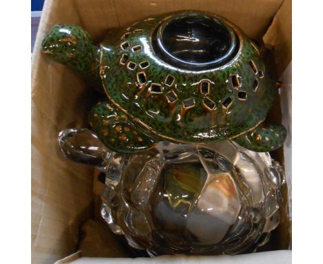 A box containing a quantity of ceramic, glass and other tortoise models