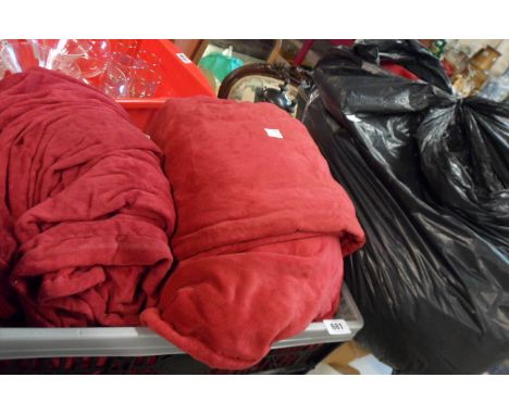 A quantity of red velvet curtains