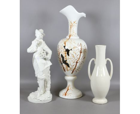 A large white glazed pitcher and a twin handled vase along with a figural gallant.