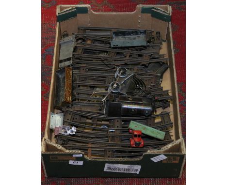 A collection of Hornby O gauge model railway items including track, engine and rolling stock (AF).