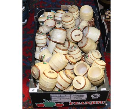 A box of ceramic British tourist souvenir wares to include mainly Manor ware model boots, barrels, bells, etc.