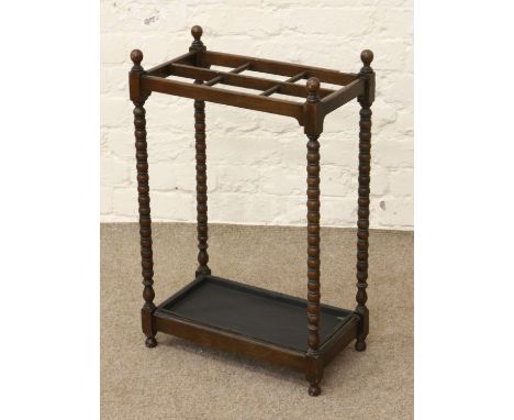 An Edwardian bobbin turned stick stand.