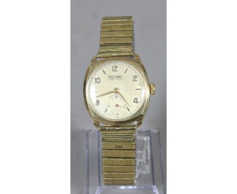 A vintage 9 carat gold Rotary Super Sports manual wristwatch on expanding bracelet strap with Arabic numeral and baton marker