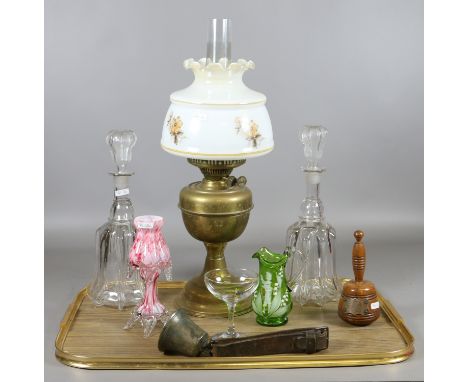 A tray lot comprising brass based oil lamp, a pair of ornate decanters, a Mary Gregory green glass jug and art glass along wi