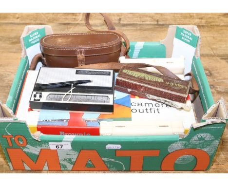 A cased pair of binoculars (Wray, London, Magnivu 8x30) and a Stylophone, along with a harmonica and a Kodak camera. Conditio