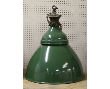 An industrial green enamel hanging lamp.