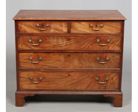 A George III mahogany bachelors chest of two over three drawers. With raised cock beading and bracket feet, 97cm wide, 47.25c