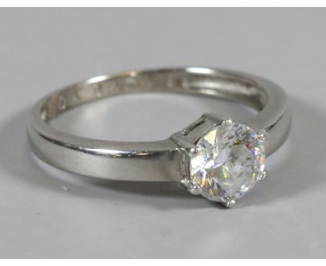 A ladies white metal solitaire ring with internal inscription 'I Love You'.