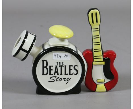 A signed Lorna Bailey ceramic teapot 'The Beatles Story'. Condition Report. To be used as a guide only. Good condition. No da