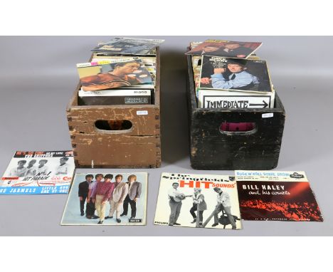 Two boxes of 1960 single records in original sleeves to include Bill Haley, Rolling Stones, Everly Brothers, etc.