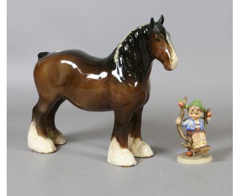 A Beswick bay shire horse and a Hummel figure.