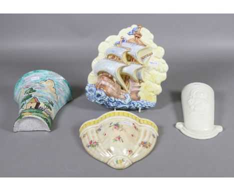 Four ceramic wall pockets to include Crown Ducal examples.