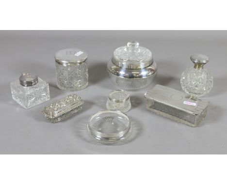 Eight pieces of silver and cut glass including powder bowl, inkwell, salt cellar and a scent bottle.