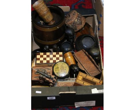 A box of mostly wooden items to include carved African tribal art, chess boards and pieces, sewing boxes, wooden planter, pot