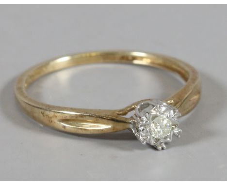 A ladies 9 carat gold diamond solitaire ring, size N.