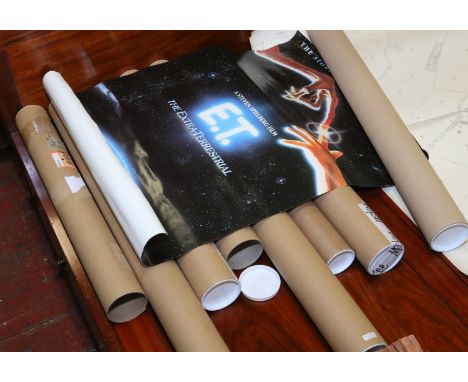 A collection of eight vintage film posters to include E.T, Dirty Dancing, Planes, Trains and Automobile, Bat 21 etc.