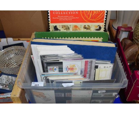 Quantity of assorted first day covers and stamps