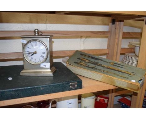 White metal mantel clock together with an antler handled carving set and another carving set