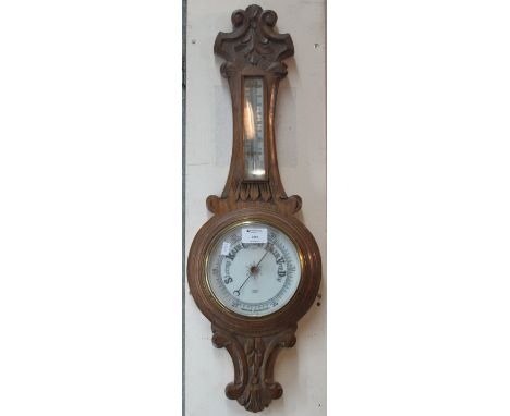 Aitchison of London oak aneroid wall barometer.(B.P. 24% incl. VAT)