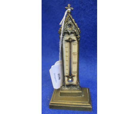 Brass Gothic design thermometer, having ivory panel, marked: Southampton, with weather ranging from freezing to blood heat. (