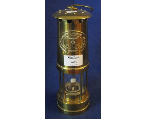 Reproduction brass miner's safety lamp marked: E. Thomas and Williams Ltd., Aberdare. (B.P. 24% incl. VAT)