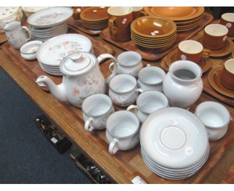 Two trays of Denby stoneware 'Encore' floral teaware and other items comprising: mugs and saucers; teapot; plates; baluster v