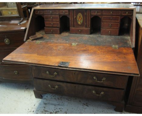 18th Century mahogany fall front bureau, having two short and three long drawers, on bracket feet, the interior revealing var