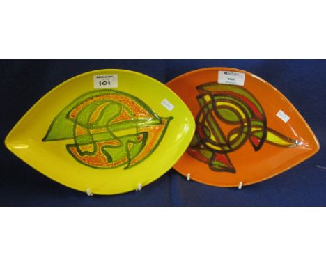 Two similar Poole Pottery oval shallow dishes, having abstract decoration on lemon and orange grounds, printed marks to base.