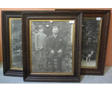 Three large scale black and white oak framed family portrait photographs. (3) (B.P. 24% incl. VAT)